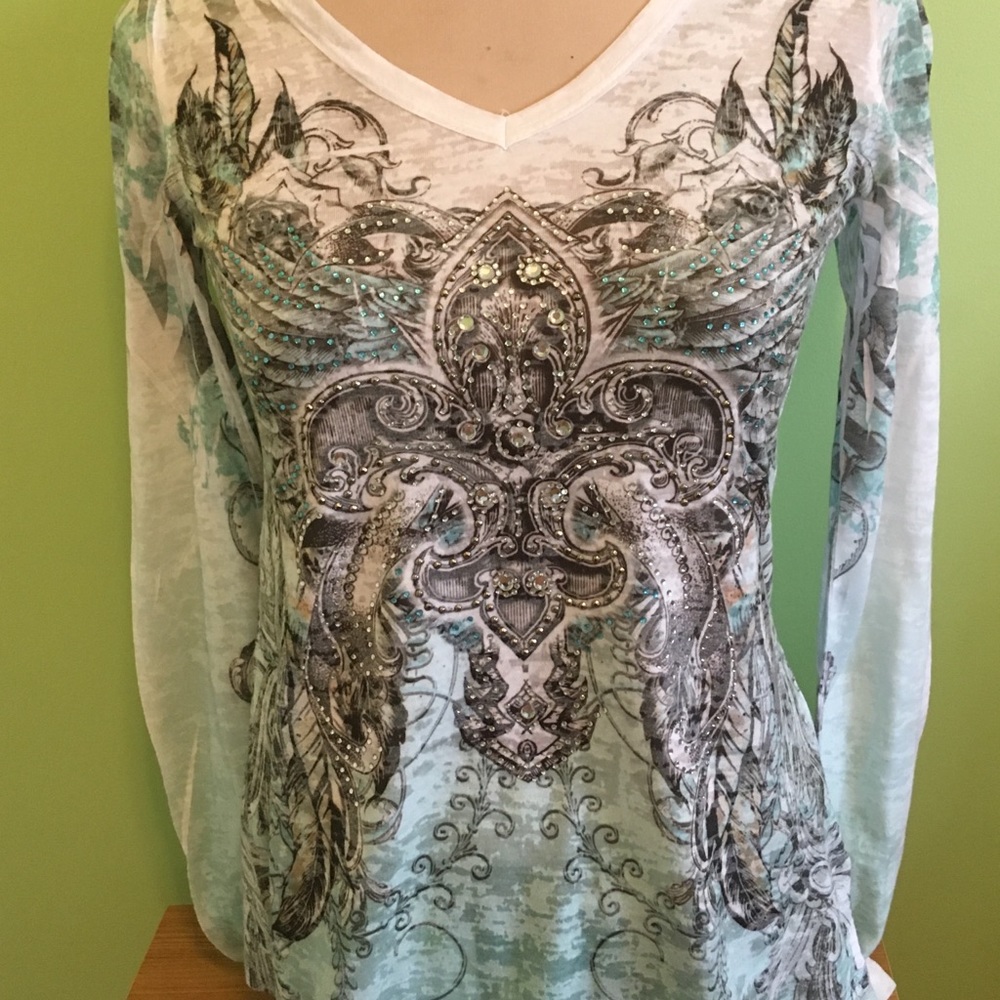 A white, green,and Silver Shirt